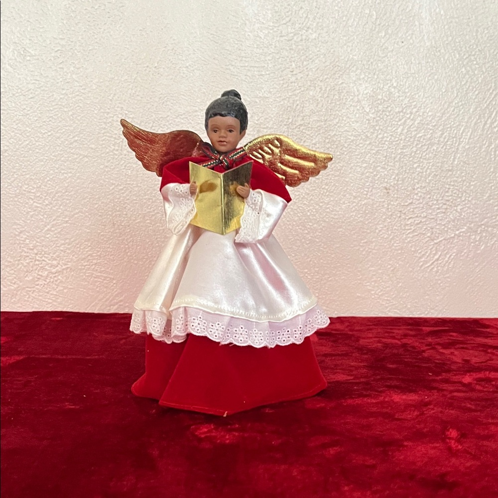 Red and White Angel Figurine with Gold Wings